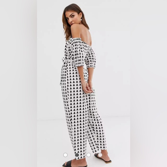 ASOS Pants - ASOS DESIGN off shoulder button front jumpsuit with tie waist in triangle print